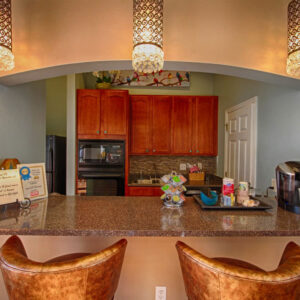 Breakfast bar and kitchen at our club house - The Legends Apartments