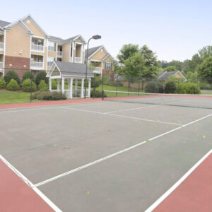 Tennis court at The Legends Apartments