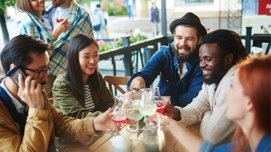 group of friends cheersing drinks