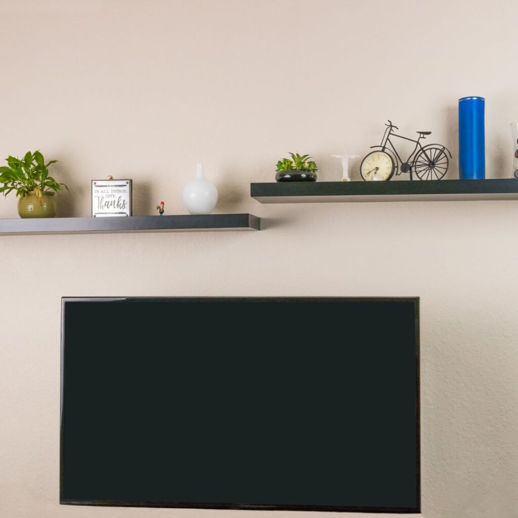 floating shelves above tv