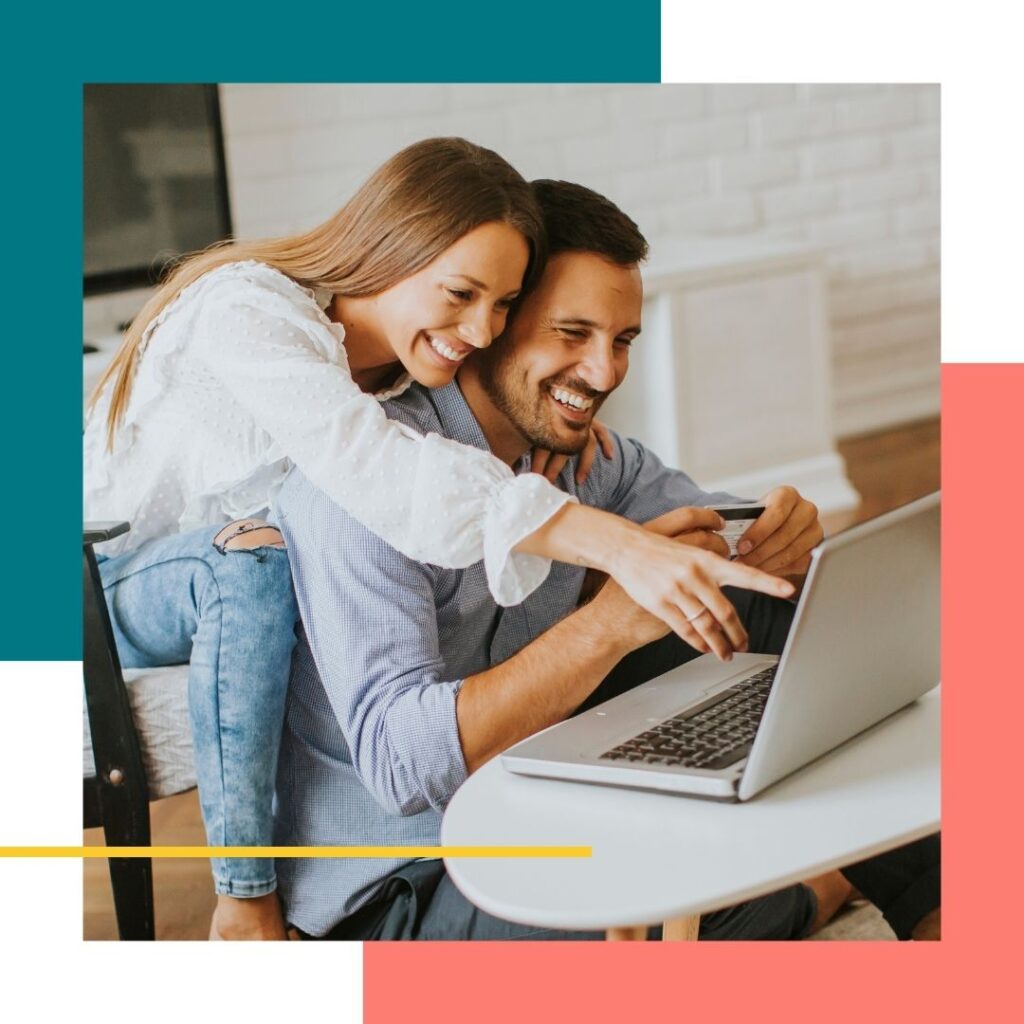 Couple looking at a laptop