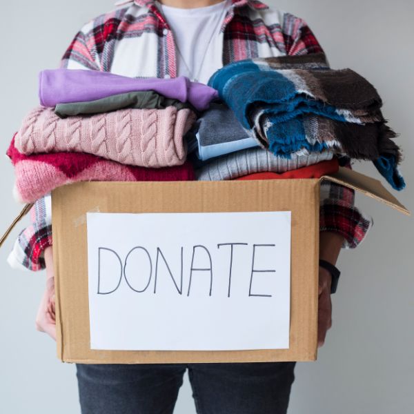 Clothes in a box that will be donated