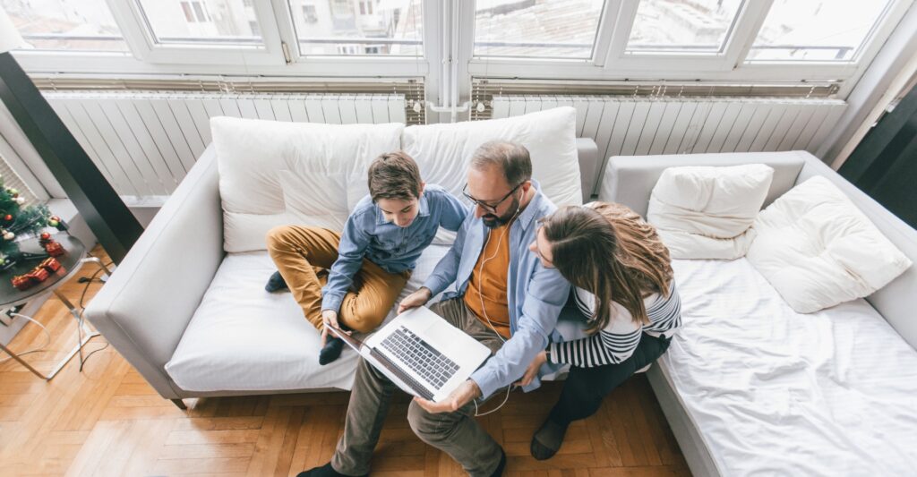 Family sitting on a couch