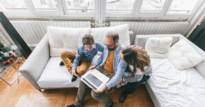 Family sitting on a couch