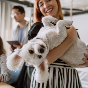 Woman holding a dog