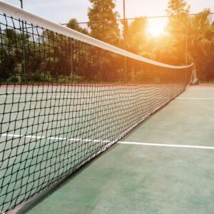 A tennis court at sunset