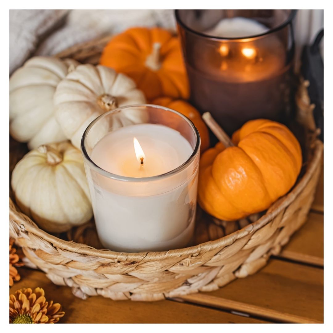 table decorating with small pumpkins and candles