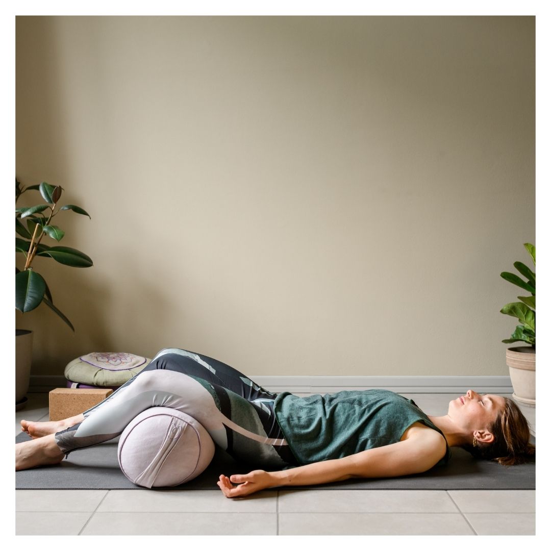 woman doing yoga in apartment