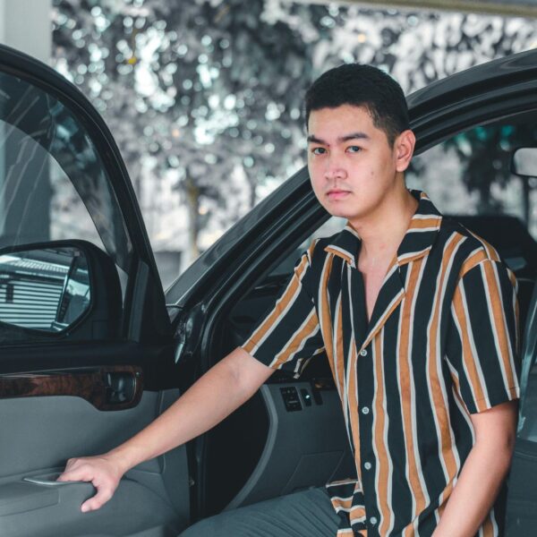 man getting out of his car