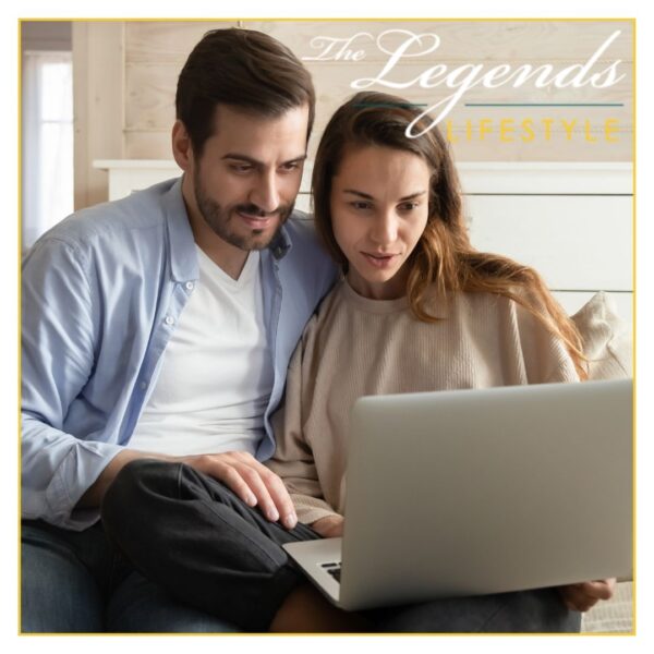 a couple looking at a computer